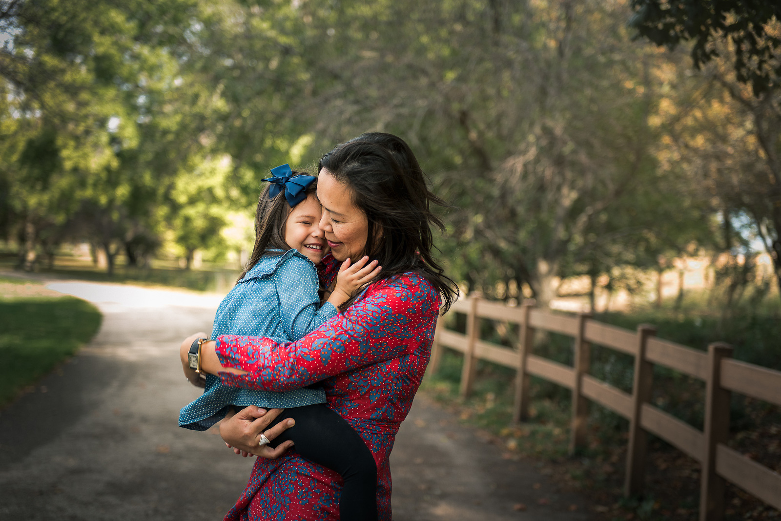 mother-and-daugher-hugging-outdoors