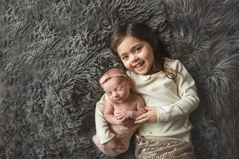 newborn with sibling photography